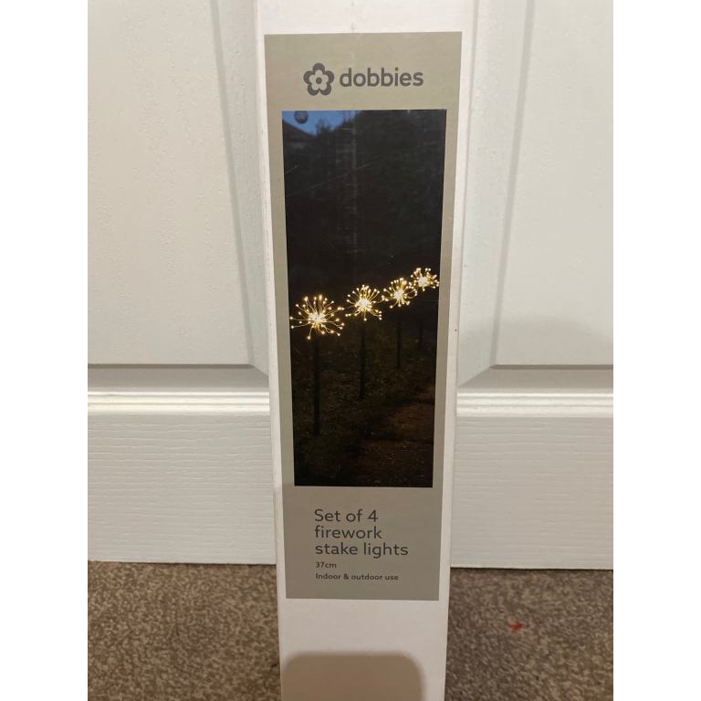 Dobbies set of 4 firework stake lights for indoor and outdoor use. 
