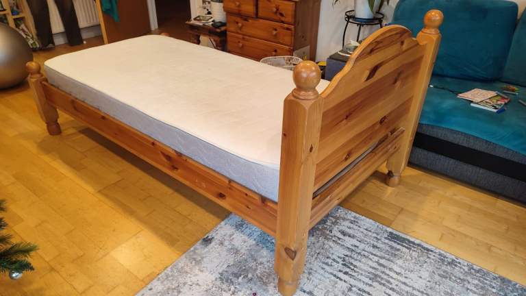 Pine single bed with 6 month old mattress.