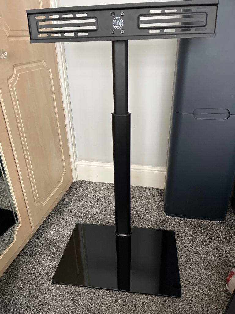 Television stand for bed 