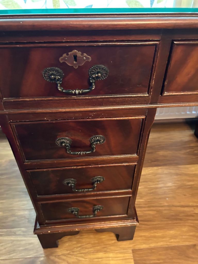 Traditional Brown Wooden Desk with Red Leather Inlay and Glass Top