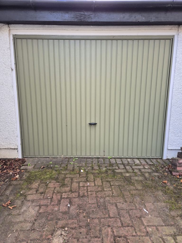Thornby Canopy Framed Metal Garage Door