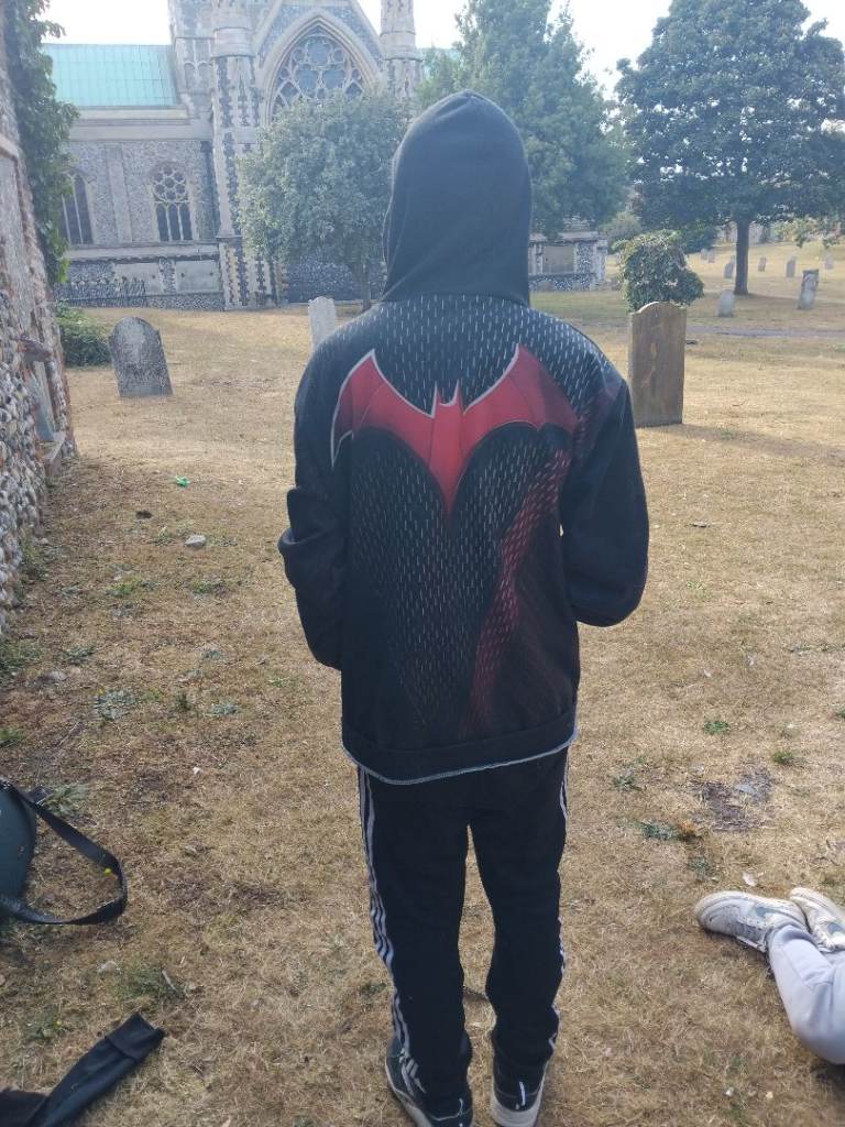 Kids Black Hoodie with Red Bat Logo – Good Condition