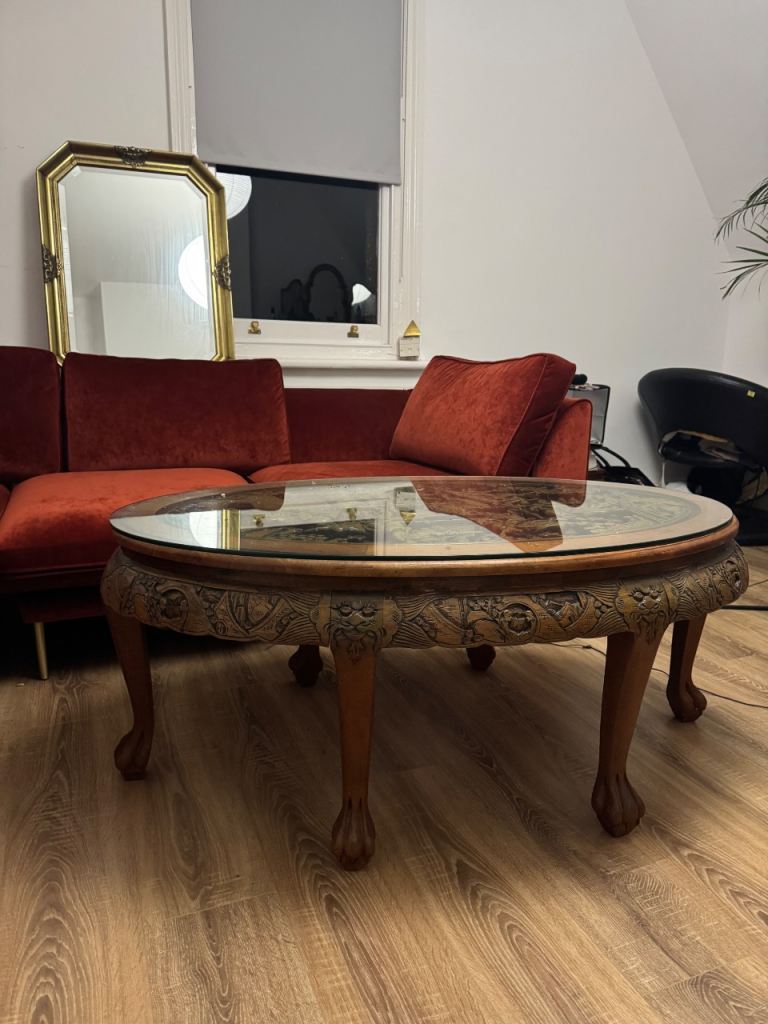 Antique Chinese carved oval coffee table