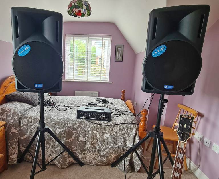 PA System, Two large amplified speakers with covers and stands & 4 channel mixer amp. Good condition