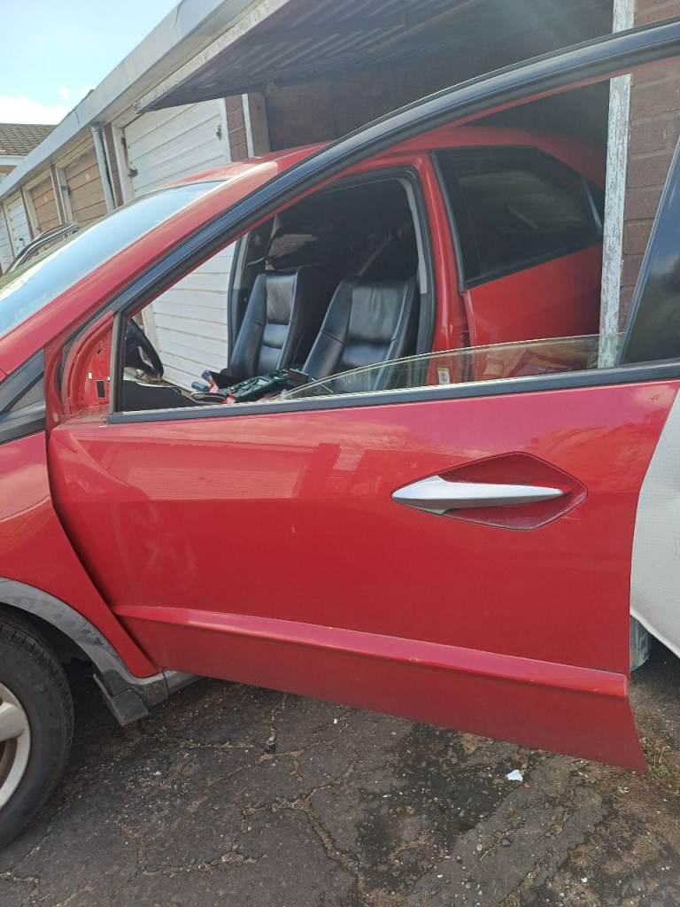 Red 5-door hatchback. Mileage. Engine runs (i-VTEC), good for breakers or parts.