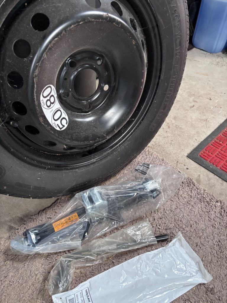 Nissan spare wheel and jack