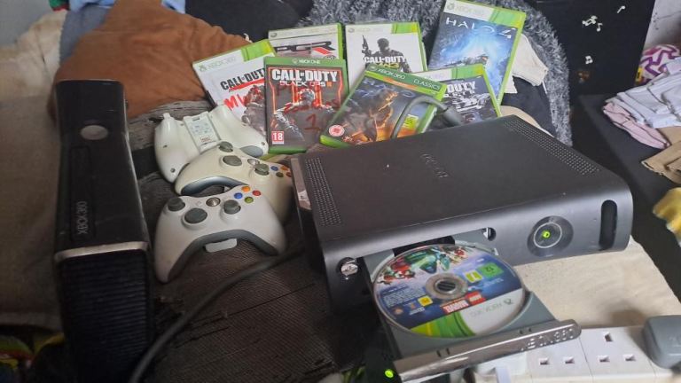 2Xbox 360 and games in pictures included and controllers read description for info.