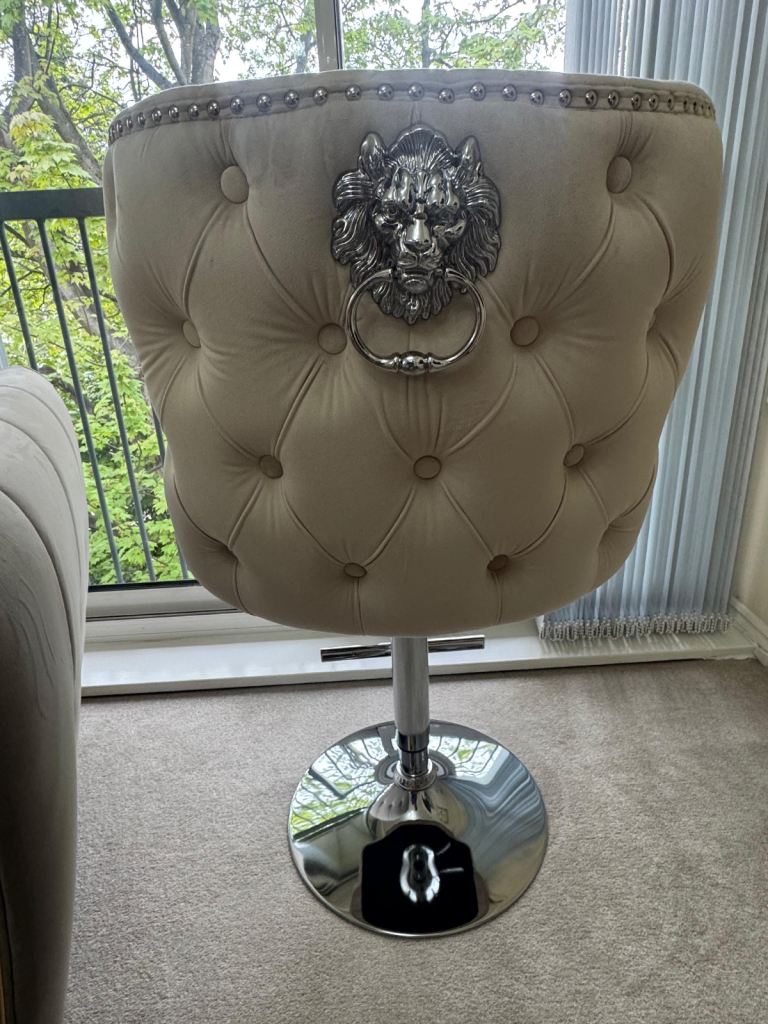 Pair of Beige Velvet Swivel Bar Stools with Lion Head Detail