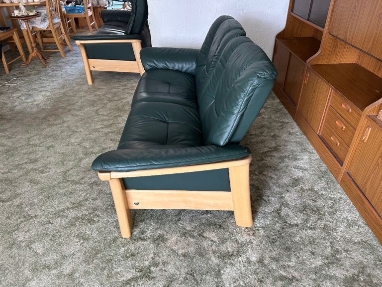Two-Seater Green Leather Sofa – Good Condition