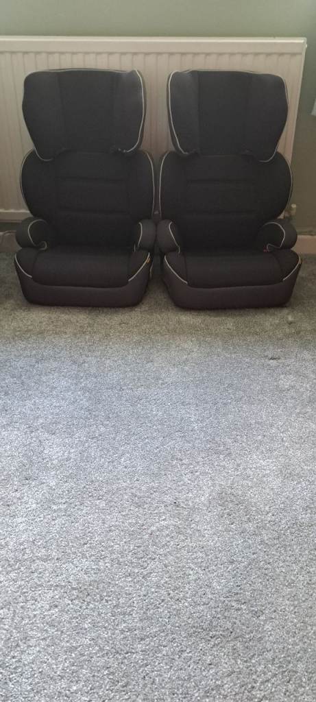 A Pair Of Childs Car Seats