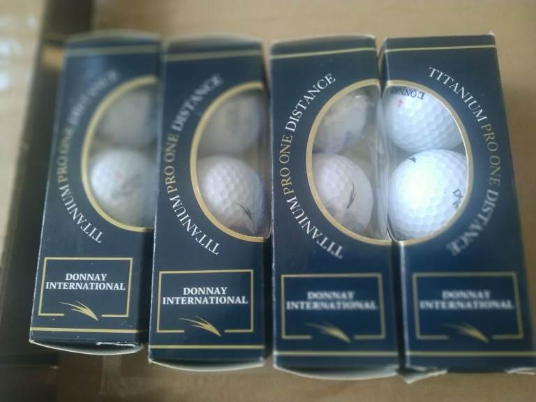Golf balls all new in packs never used 