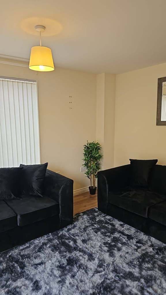 Black Velvet 2-Seater Sofa – Good Condition