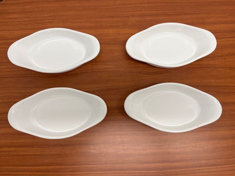 Four White Porcelain Oval Eared Dishes