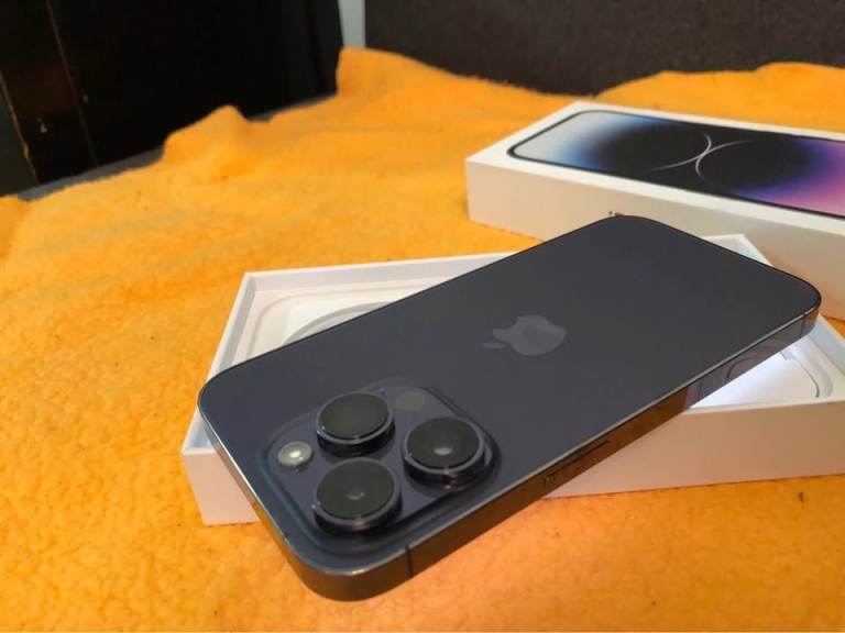 New condition iPhone 14 Pro purple 128gb unlocked in box