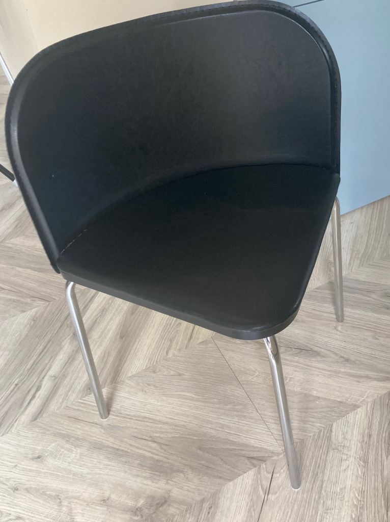Dinning table and 2 tucked chairs 