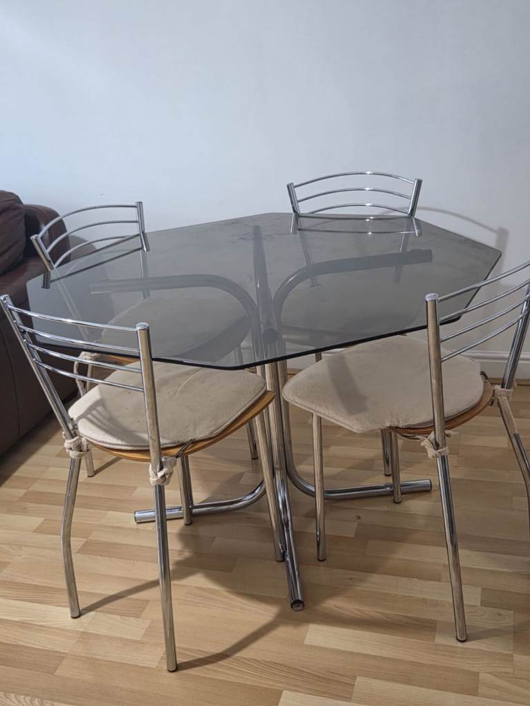 Glass Dining Table with 4 Chrome Chairs – Good Condition