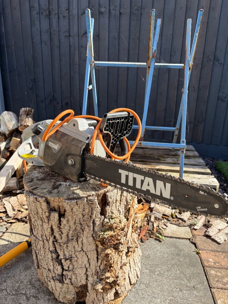 Titan electric chainsaw with essential accessories 
