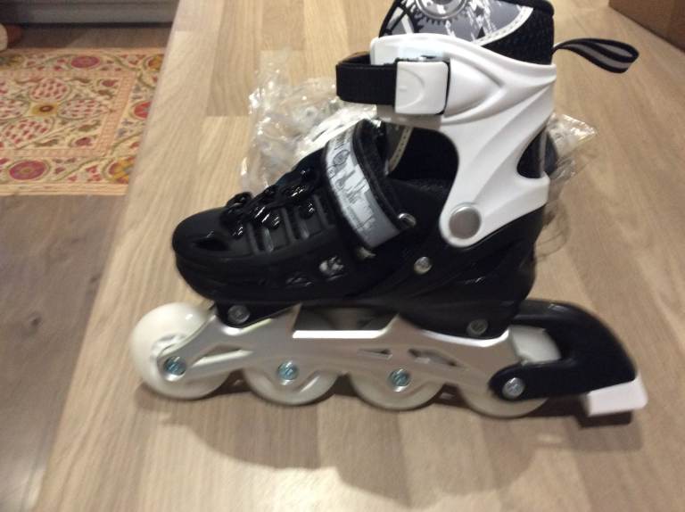 Brand New Adjustuble Roller Skates for children