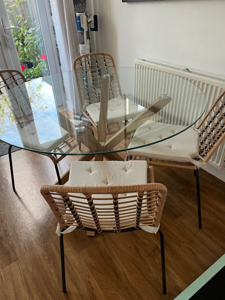 Clear glass table and rattan effect chairs x4