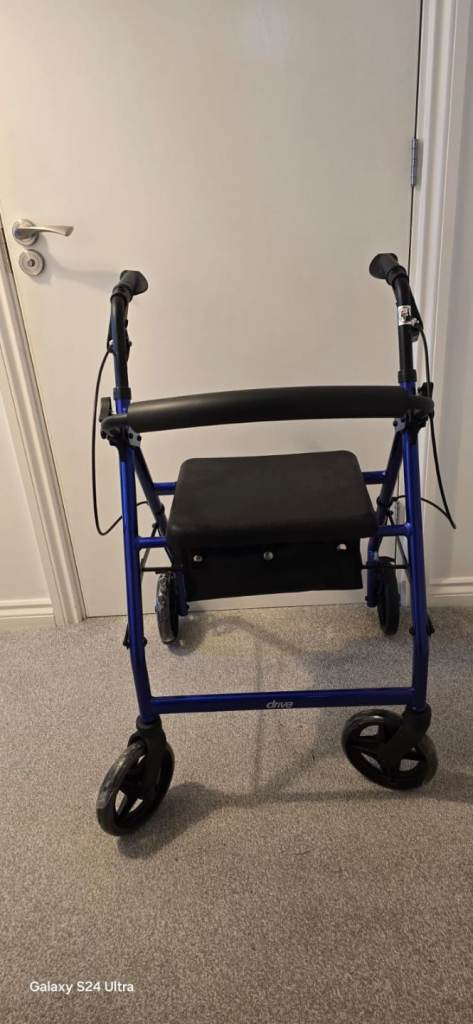 Light weight walker with seat