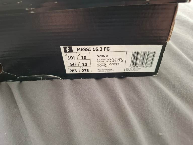 Adidas Messi size 10 football boots.