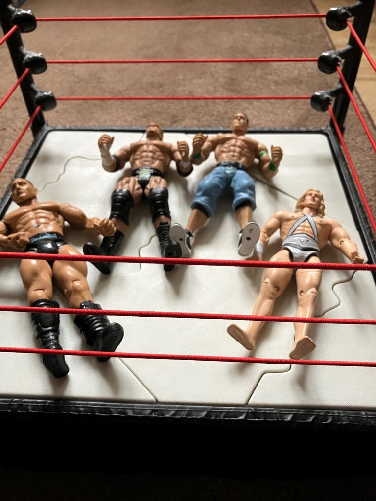 WWE Wrestling Ring + 4 Figures