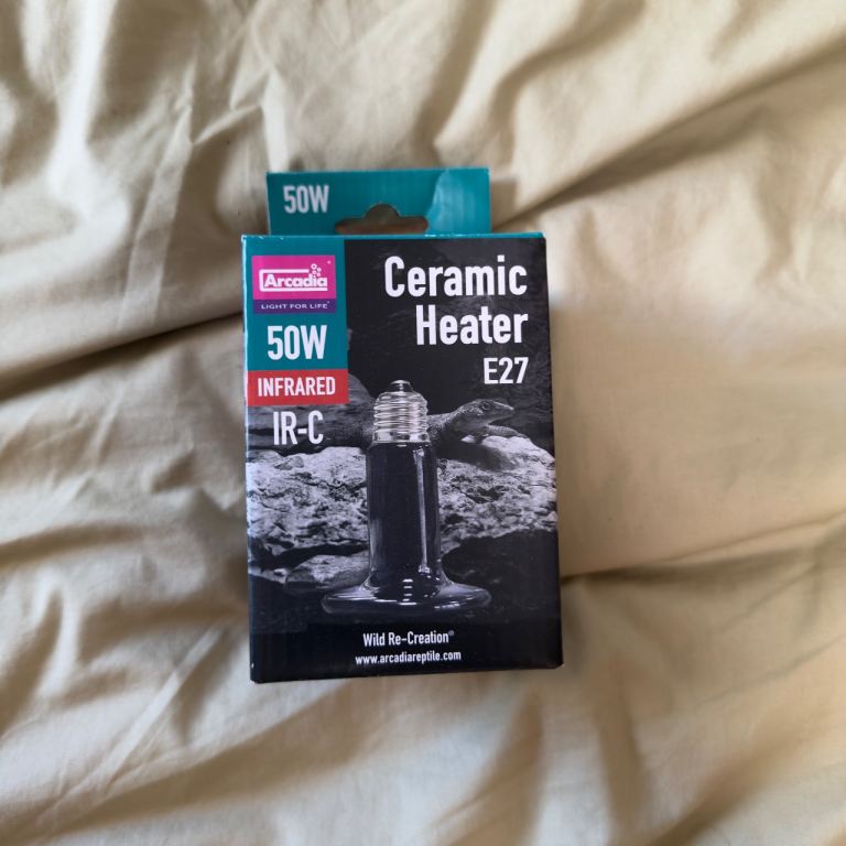 Unopened ceramic heater for a reptile vivarium 