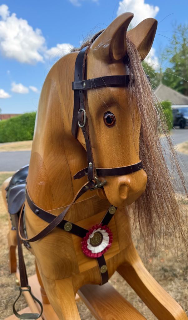 Wooden rocking horse over 25 years old in very good condition collection only as heavy