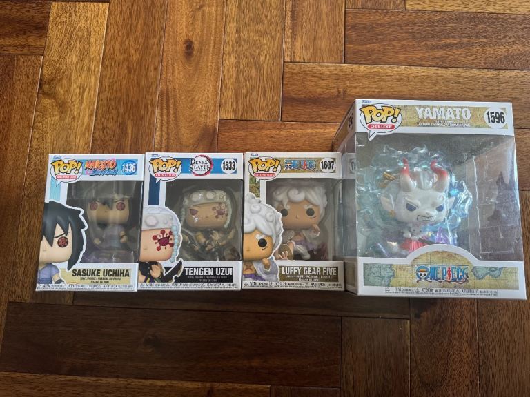 4 Funko Pop collectibles one piece demon slayer Naruto 