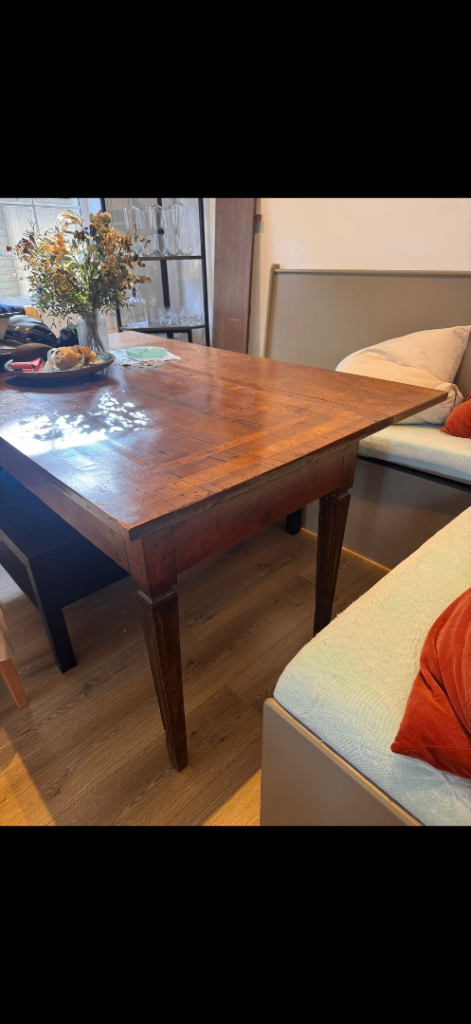 Antique wooden extendable dining table