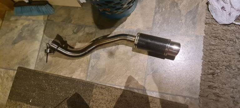 K9 on Delkevic decat and 8in Stubby bigbore.