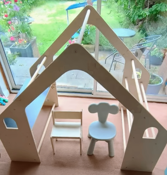 Wooden playhouse with chairs - new price was £125 (for age 1y-8y)