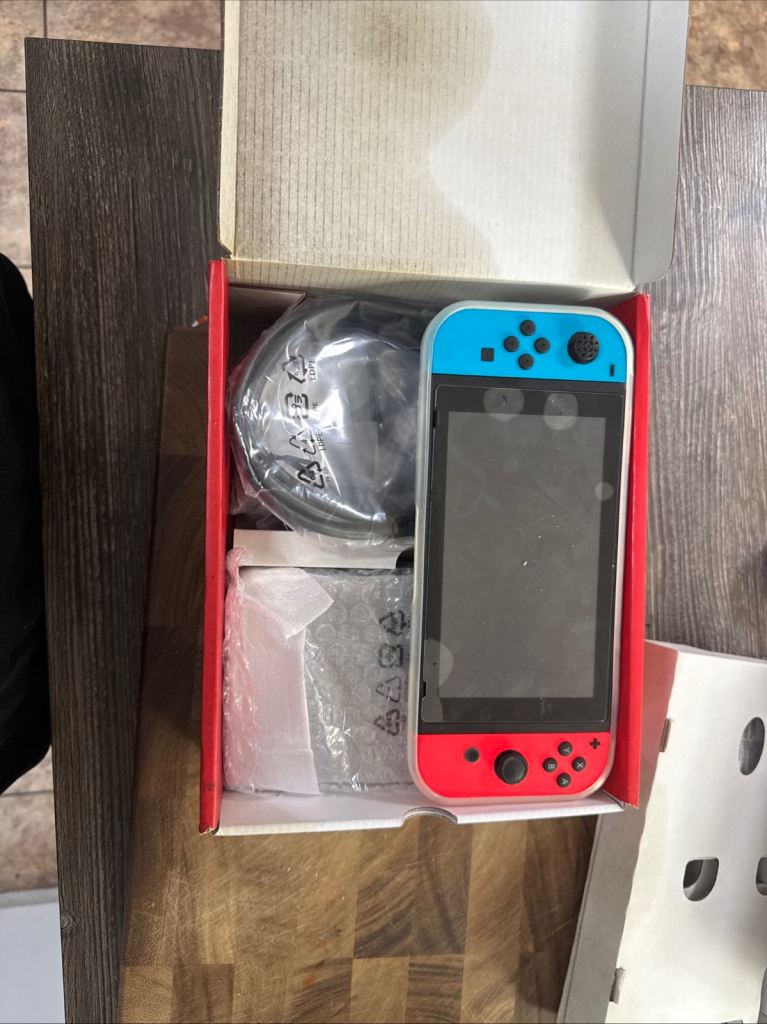 Nintendo Switch Console with Joy-Cons and Box – Good Condition