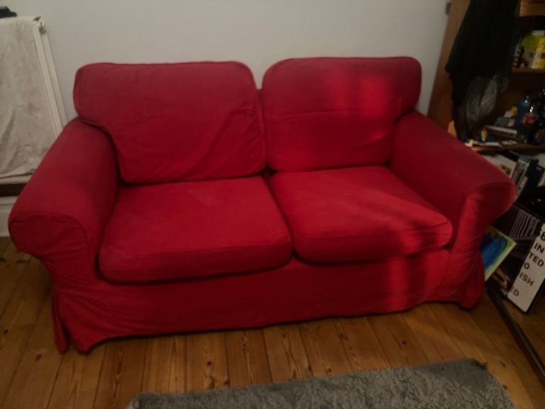Lovely Ikea Erktorp red two seater sofa 