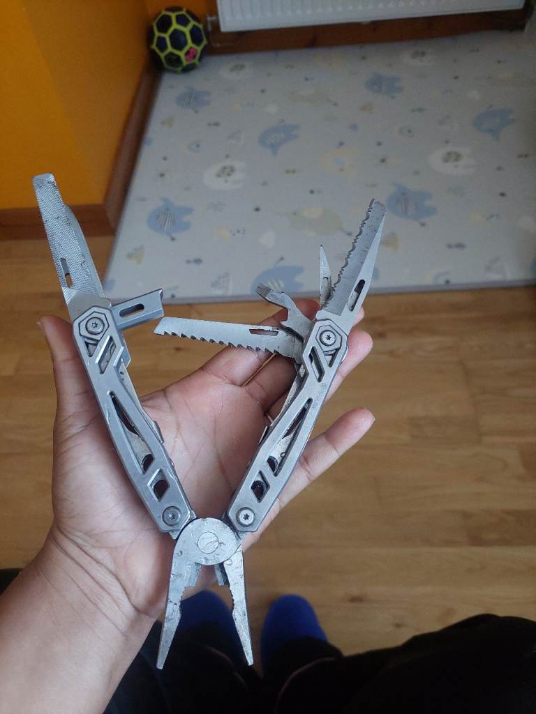 Handy Multi-Tool with Pliers, Knife, Saw – Good Working Order