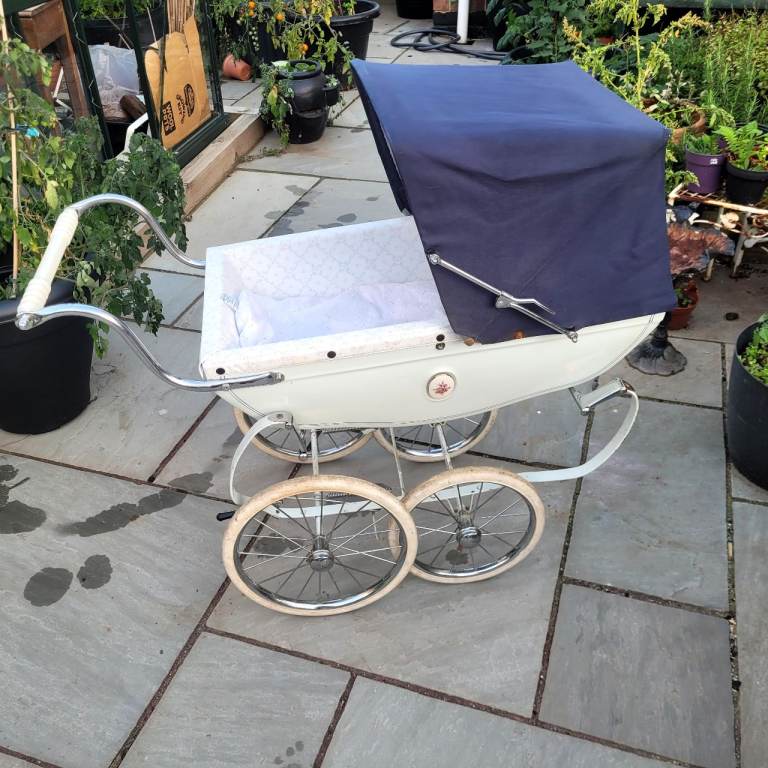 Childs Slivercross coach pram