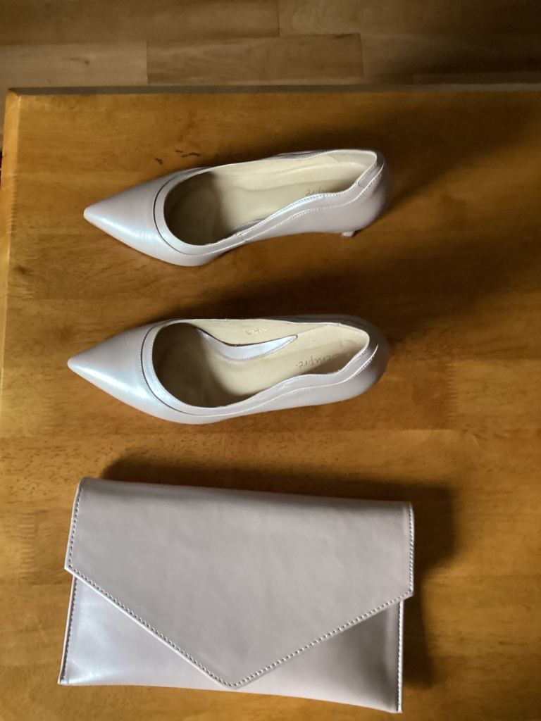 Pair of pale pink court shoes and Matching Clutch Bag shoe size 40