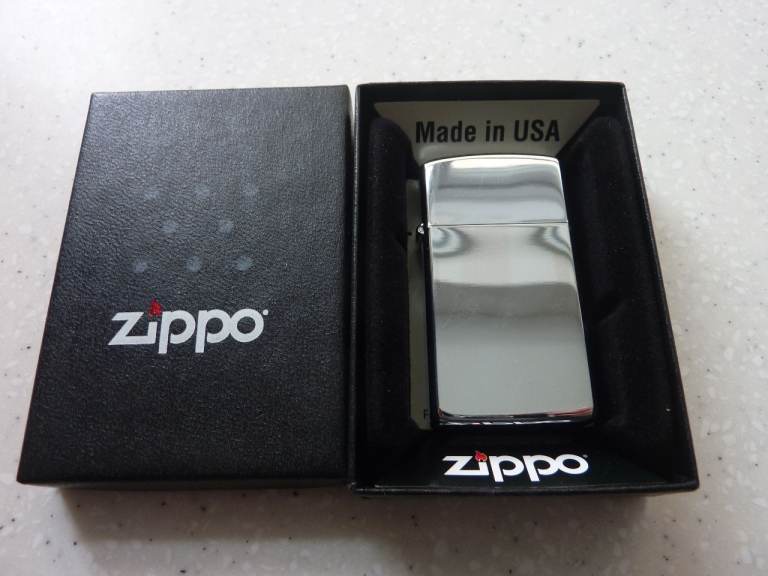 ZIPPO Slimline Chrome finish lighter.  Boxed.
