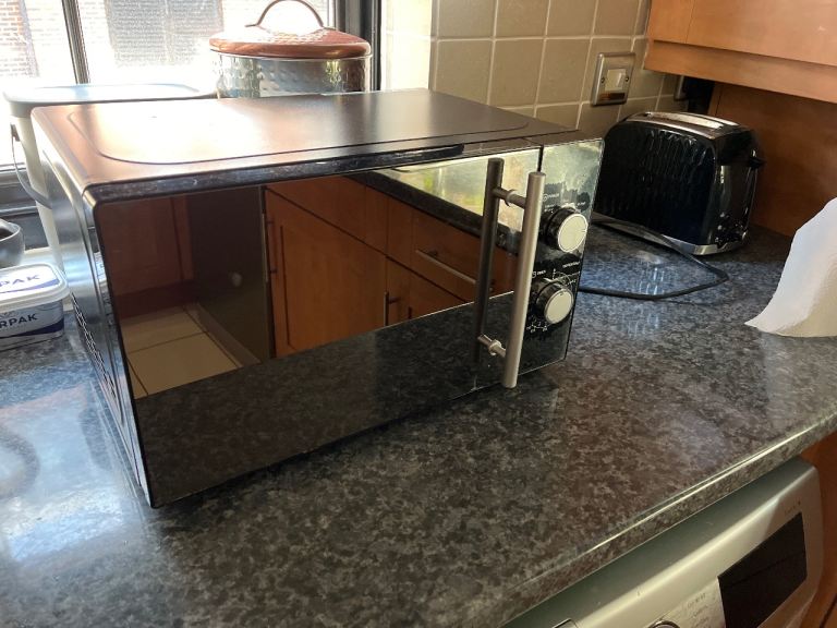 Black Microwave Oven – Good Working Condition