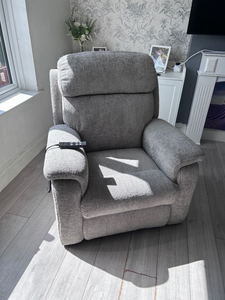 Electric reclining chair with stand assist