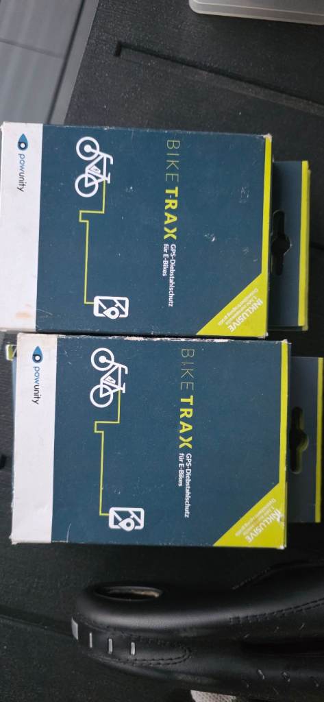 Two bike trax GPS trackers. 