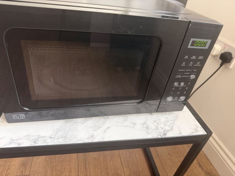 Black Microwave Oven – Good Condition, Fully Working