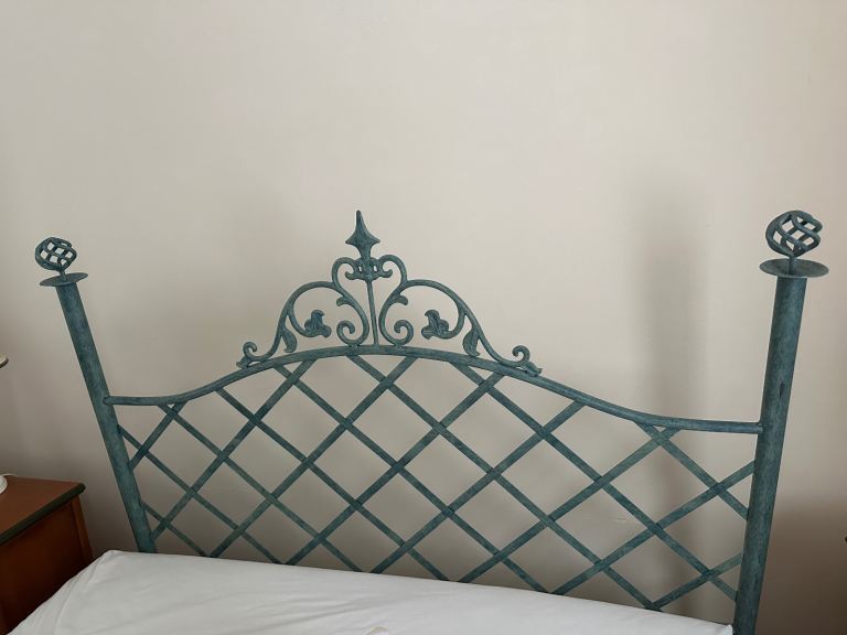 Green metal double bed headboard 