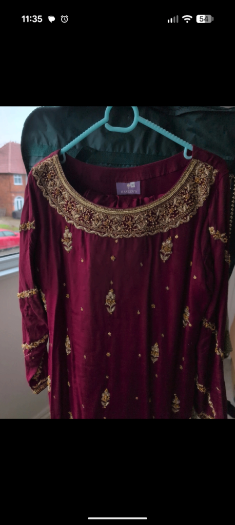 Dark red sharara style suit.