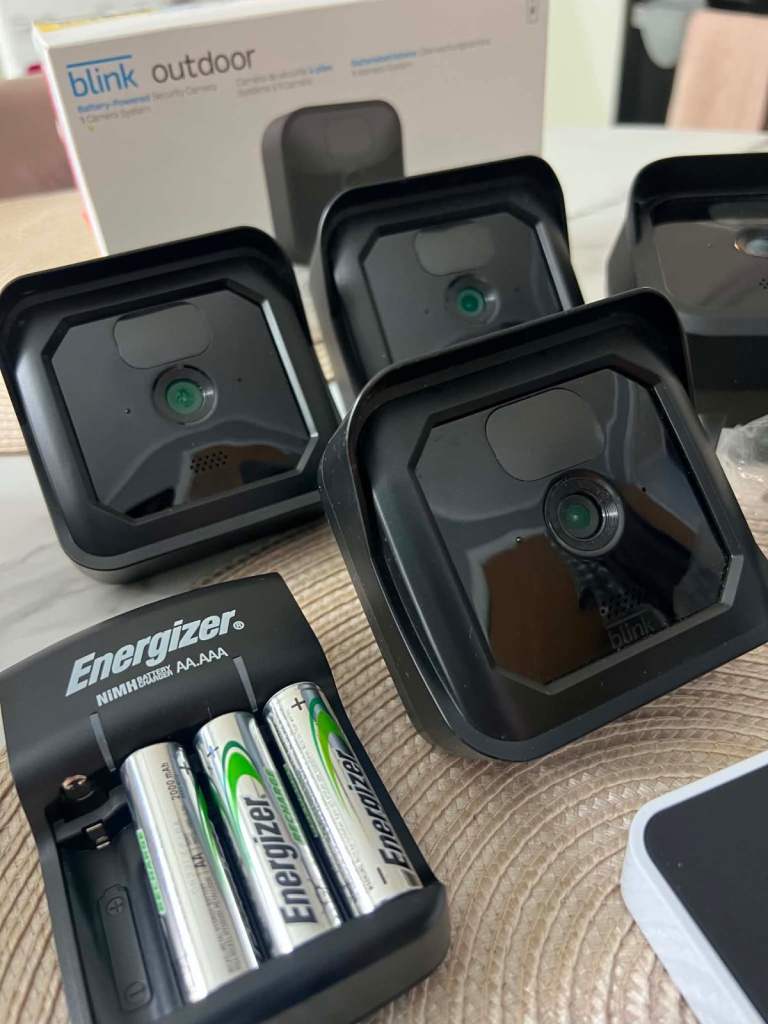Blink Outdoor Security Cameras (4-Pack) with Charger – Good Condition