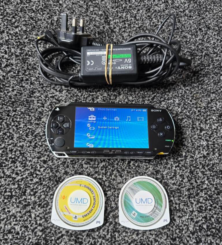Sony PSP 1003 Console With Genuine Power Supply & 2 Games.