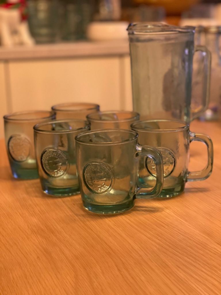 Recycled glass pitcher and 6 x San Miguel glasses 