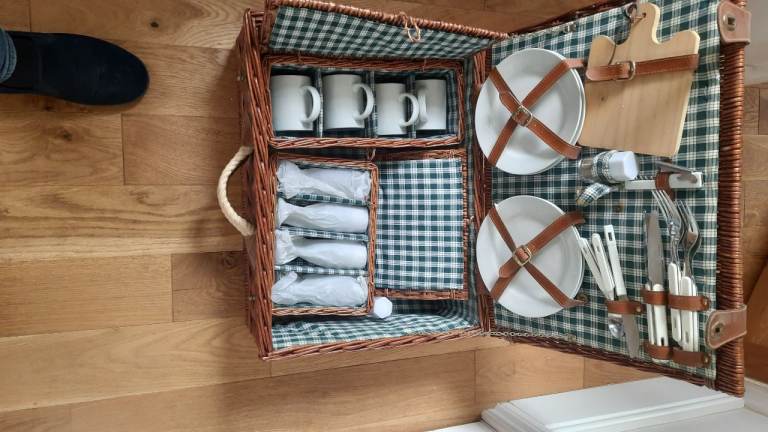 Picnic basket, plates, cups, glasses and cutlery