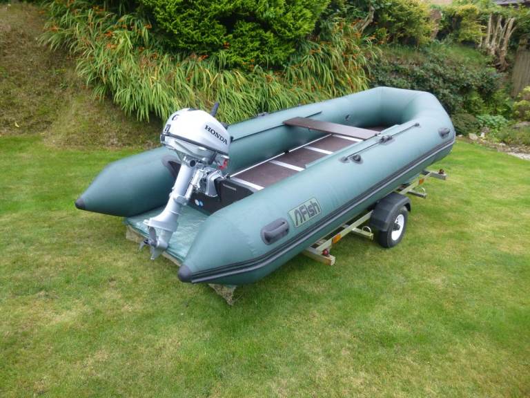 Inflatable Dinghy with Honda Outboard Motor and Trailer – Good Condition