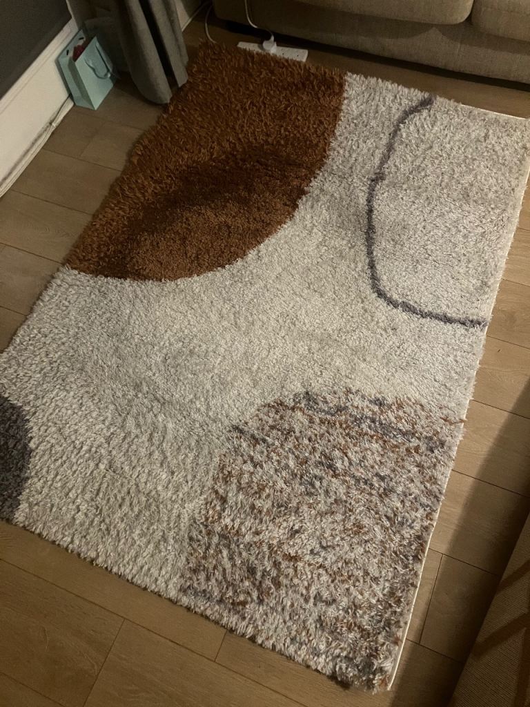 Red, blue and cream rug